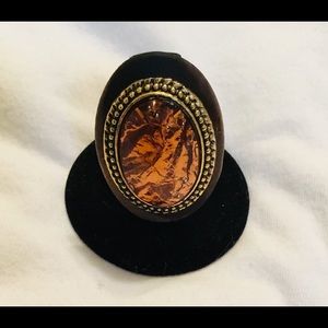 Vintage Amber Lucite Stone on Oval Wooden Setting.